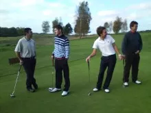 waiting to tee off